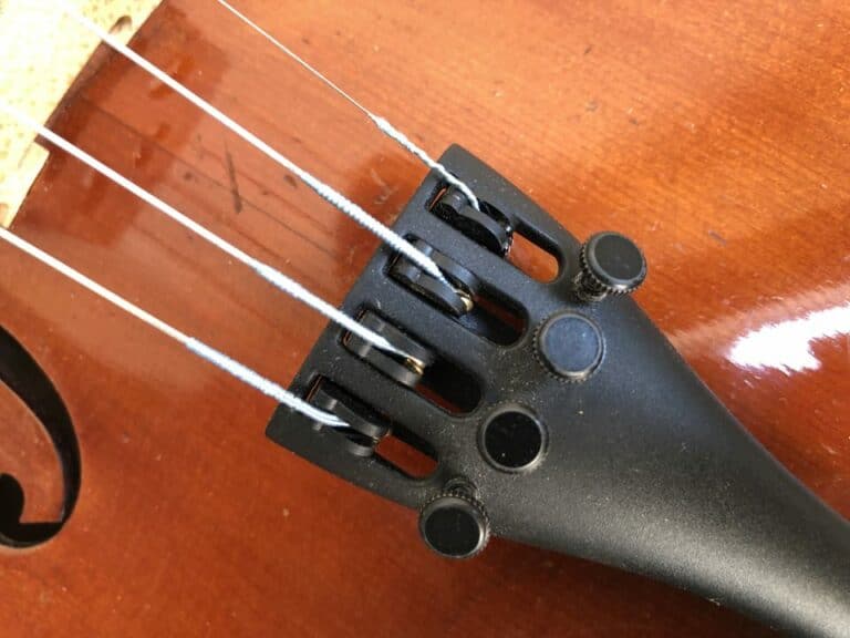 Where are Violin Strings Attached? (With Pictures) Violin Trend