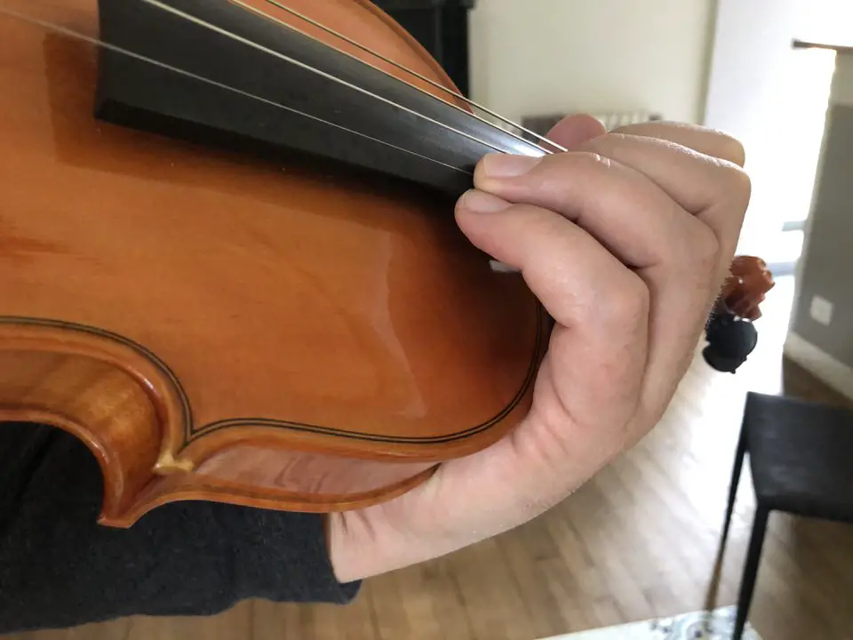 There is no room for fingers on the upper part of a violin's fingerboard
